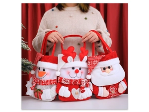 Three festive knitted Christmas gift bags featuring snowman and Santa Claus designs