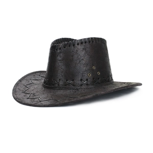Detail of dark brown vintage cowboy hat featuring cracked leather texture and stitched seams