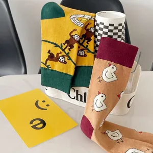 Mid-calf cotton socks with cute animal prints featuring monkey and chick designs