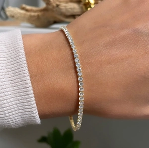 Classic gold titanium steel tennis bracelet with sparkling cubic zirconia stones for women