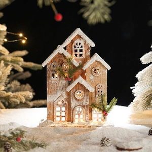 Cabane de Noël en bois lumineuse avec neige artificielle et éclairage LED chaleureux