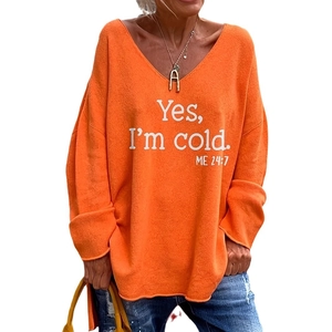 Pull femme en maille orange surdimensionné avec col en V et slogan imprimé