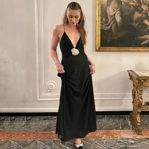 Elegant deep V-neck black chiffon maxi dress with a white 3D camellia floral waist detail