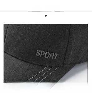 Detail of SPORT letter embroidery on the twill fabric of a casual baseball cap
