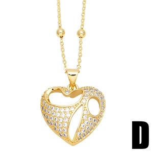 Elegant gold heart pendant necklace with shimmering cubic zirconia pavé on a thin chain