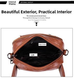 Vue intérieure du sac bandoulière en cuir marron avec compartiment et poche zippée
