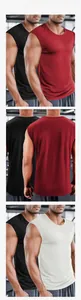 Three-panel view of men's quick-dry fitness tank tops in black, burgundy and white colors
