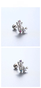Macro detail of floral titanium steel ear studs with marquise crystals and round pearls