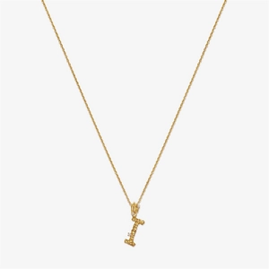 Close-up of golden letter I pendant with organic branch texture and small diamonds