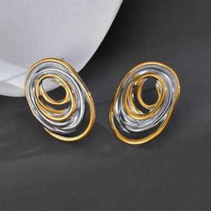Modern wavy spiral oval earrings in gold and silver finish with stainless steel texture