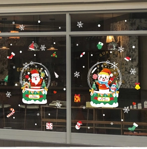 Détail de stickers de Noël avec Père Noël, bonshommes de neige et flocons de neige