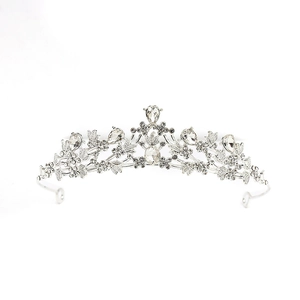 Detailed macro view of silver bridal crown with intricate floral crystal patterns