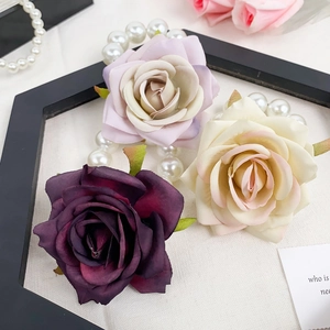 Elegant silk rose flower hair ties in deep purple and soft pink with pearl chain decor