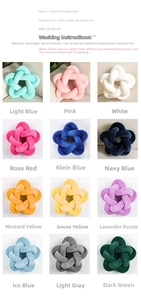 Detail view showing 12 vibrant colors and dimensions of star-shaped knotted pillows