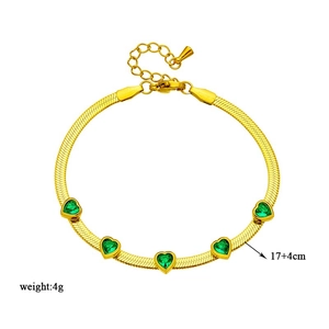 Golden snake chain bracelet with five green heart-shaped zircons and extension chain