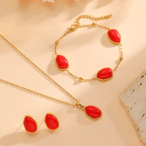 Set gioielli in acciaio inossidabile dorato con pietre ovali rosse incluse collana e bracciale