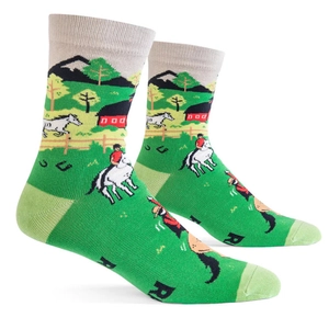 Detail of green cotton crew socks featuring vibrant cartoon farm and horse patterns
