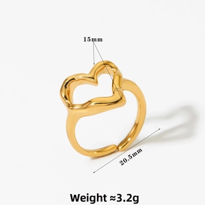 Macro detail of gold hollow heart ring showing dimensions of 15mm width and 3.2g weight