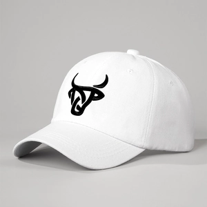 Detailed view of black bull head embroidery on white cotton six-panel baseball cap