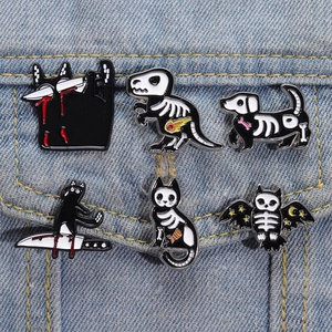 Gothic Halloween enamel pin set featuring skeleton animals on denim jacket pocket