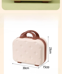 Detail view of a 14-inch mini suitcase with quilted pattern and 30x15x23cm dimensions