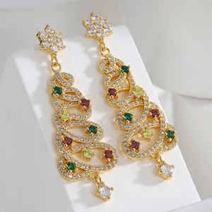 Elegant Christmas tree drop earrings with colorful zircons and golden tassels on white
