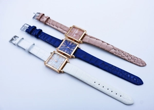 Detailed comparison of three square quartz watches with Roman numeral dials and leather straps