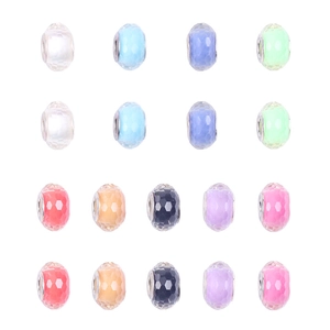 Macro view of multifaceted ocean-themed glass beads with metal cores for DIY jewelry sets