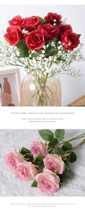 Detail of red and champagne velvet artificial roses with babys breath for home decoration