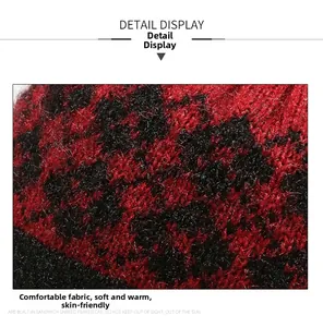 Macro detail of red and black checkered knit fabric with soft plush texture for winter hat