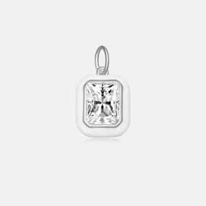 Detailed macro view of S925 silver necklace with radiant cut emerald shape stone