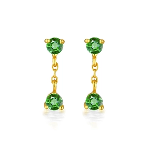 Elegant gold drop earrings featuring two round green gemstones on a delicate chain