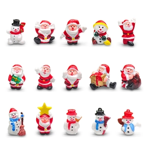 Set of 15 miniature Christmas resin figurines including Santa Claus and snowmen models