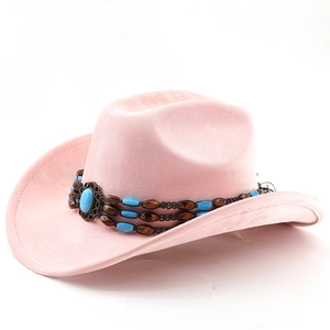 Close-up of pink suede cowboy hat featuring turquoise stone and beaded ethnic band detail