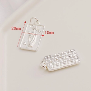 Front and back view of 20mm silver rectangle rose pendant with hand and star relief