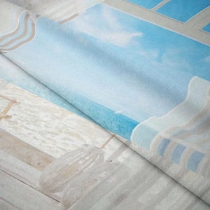 Close-up detail of soft flannel fabric featuring a scenic landscape print with flat stitching