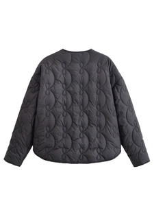 Detail view of dark grey jacket featuring unique onion quilting pattern on back