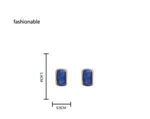 Detailed view of blue enamel rectangular earrings with gold borders and dimensions