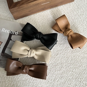 Elegant set of 4 colors PU leather bow hair clips in black, beige and brown