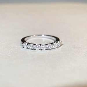 Elegant S925 sterling silver band ring featuring seven sparkling round cut zircons