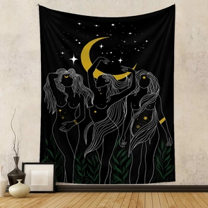 Detail of Bohemian tapestry featuring celestial moon and dancing women art on wall