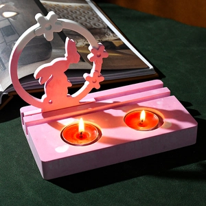 Detail of pink rabbit silicone mold for DIY oval candle holders and desktop ornaments