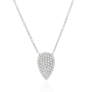 Macro view of water drop pendant with pavé set cubic zirconia on a delicate chain