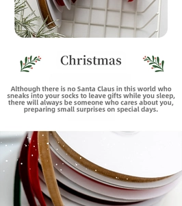 Close-up of velvet Christmas ribbons in festive red, green and gold on white spools