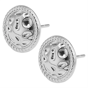 Macro view of silver geometric stud earrings with braided rope edge and textured metal surface