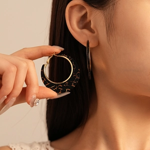 Vintage resin hoop earrings with black and gold marble texture for women