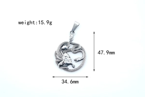 Detail view of silver Medusa pendant with specific dimensions 47.9mm and 15.9g weight