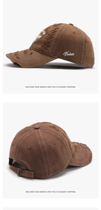 Detailed views of a distressed brown baseball cap with white Value embroidery and worn edges