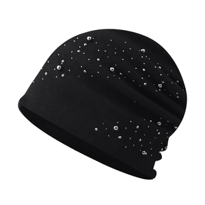 Women's black knitted beanie with silver metal studs for warm winter windproof wear