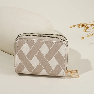 Knitted accordion card holder with striped patterns and dual zipper design in beige